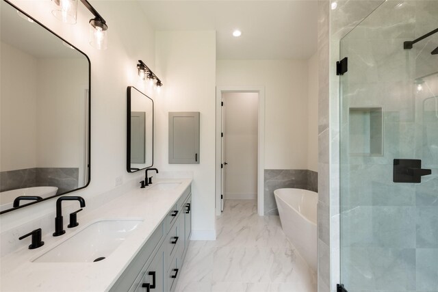 6137 Pacific Forest Dr, Houston, TX 77346 - bathroom with a stall shower, marble finish floors, a freestanding bath, double vanity, and recessed lighting