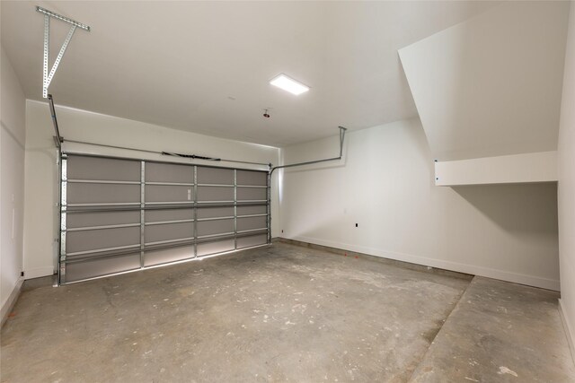 6137 Pacific Forest Dr, Houston, TX 77346 - garage featuring baseboards