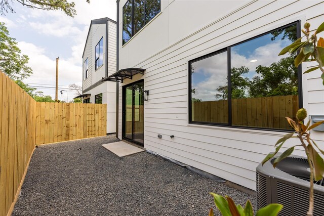6137 Pacific Forest Dr, Houston, TX 77346 - view of home's exterior with central AC