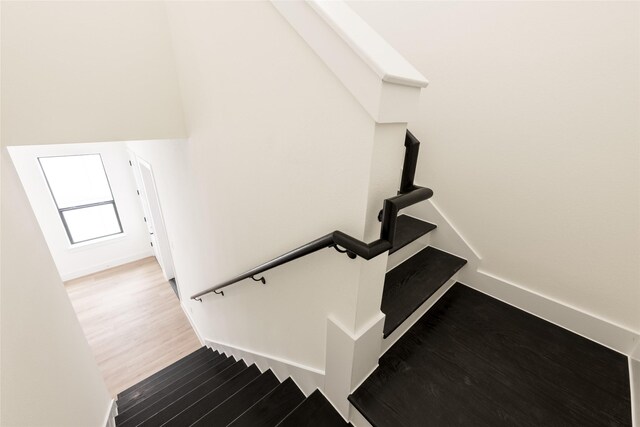 6137 Pacific Forest Dr, Houston, TX 77346 - stairs with wood finished floors