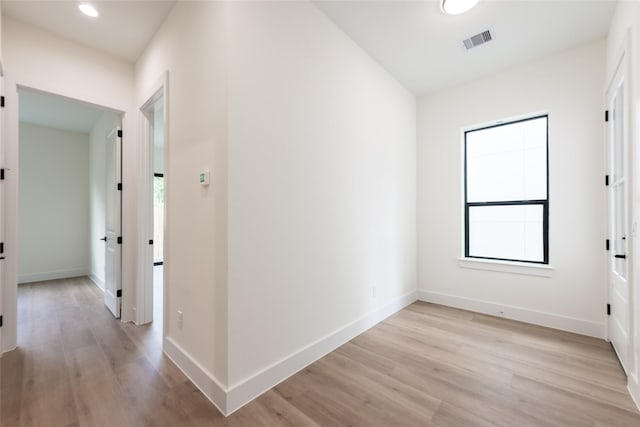 6137 Pacific Forest Dr, Houston, TX 77346 - hallway featuring light wood-style flooring, baseboards, and recessed lighting