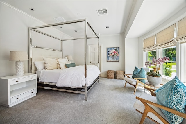 carpeted bedroom with crown molding