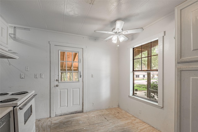2240 Easley Cir, Huntsville, TX 77320 - kitchen featuring white electric stove, a ceiling fan, and light countertops