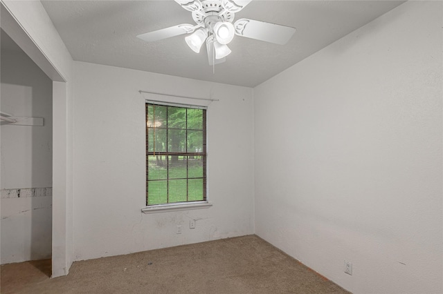 2240 Easley Cir, Huntsville, TX 77320 - unfurnished bedroom with carpet and ceiling fan