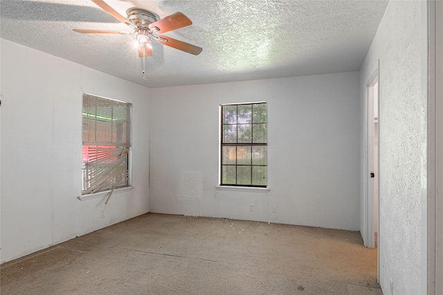 2240 Easley Cir, Huntsville, TX 77320 - spare room featuring carpet flooring, a textured ceiling, and ceiling fan