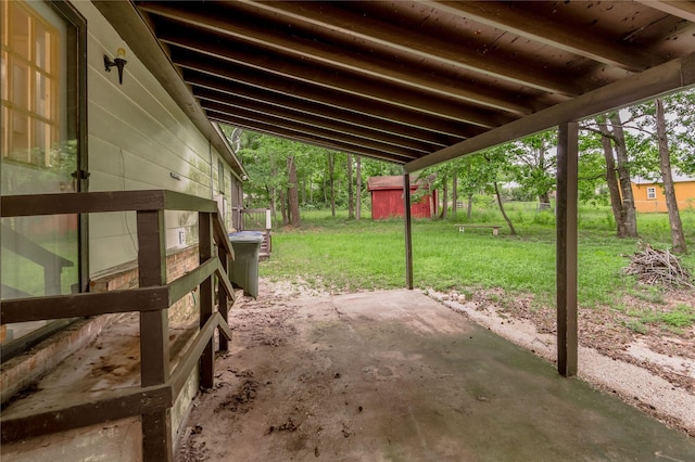 2240 Easley Cir, Huntsville, TX 77320 - view of patio / terrace with an outbuilding