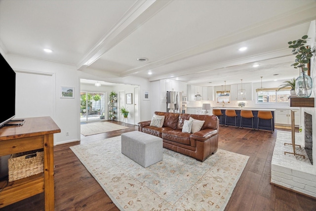 3006 Ann Arbor Dr, Houston, TX 77063 - living area with plenty of natural light, beam ceiling, dark wood-style floors, and ornamental molding