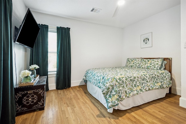 412 Merrill St, Houston, TX 77009 - bedroom with wood finished floors and baseboards