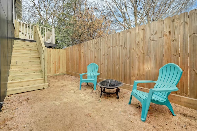 412 Merrill St, Houston, TX 77009 - fenced backyard with an outdoor fire pit