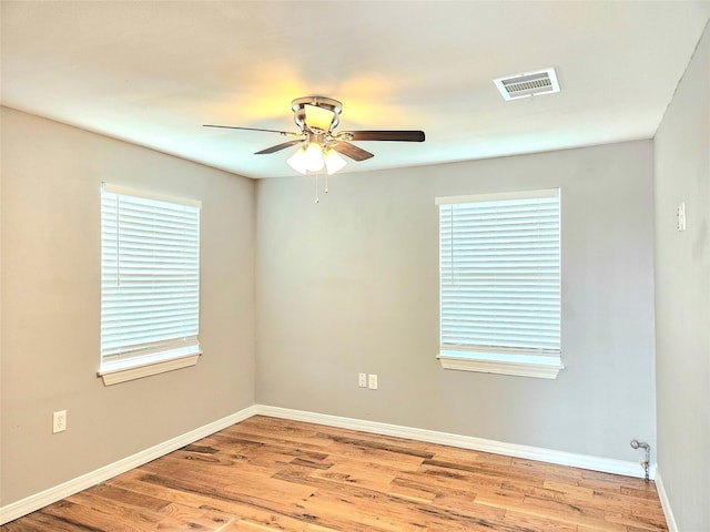 4606 Warren Way, Hitchcock, TX 77563 - empty room featuring ceiling fan, light wood finished floors, and baseboards