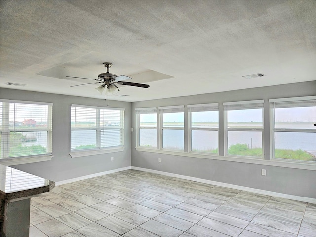 4606 Warren Way, Hitchcock, TX 77563 - unfurnished sunroom with a water view