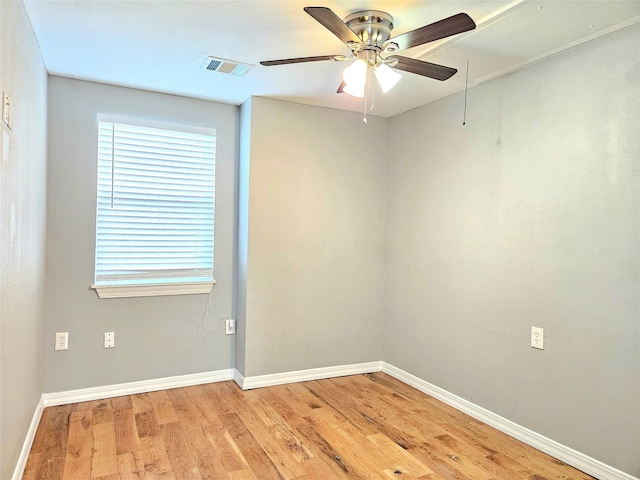 4606 Warren Way, Hitchcock, TX 77563 - empty room with baseboards, ceiling fan, and light wood-style floors