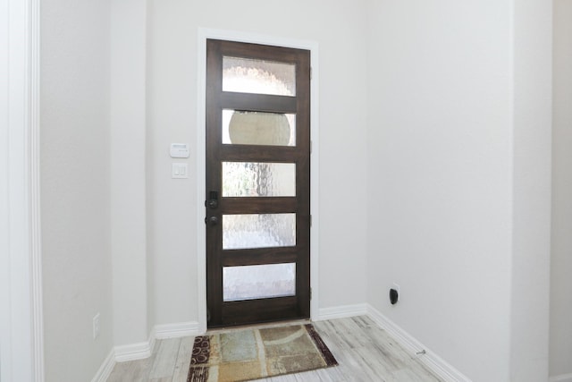 10134 Blythe St, Rosharon, TX 77583 - entryway with wood finished floors and baseboards