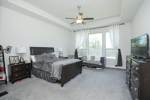 10134 Blythe St, Rosharon, TX 77583 - bedroom featuring carpet floors, a raised ceiling, ceiling fan, and baseboards