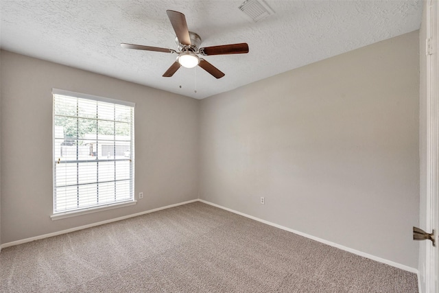 9507 Rannock Way, Spring, TX 77379 - unfurnished room with carpet flooring, a textured ceiling, baseboards, and a ceiling fan