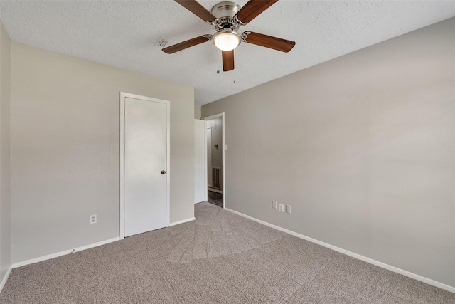 9507 Rannock Way, Spring, TX 77379 - carpeted empty room featuring baseboards, ceiling fan, and a textured ceiling
