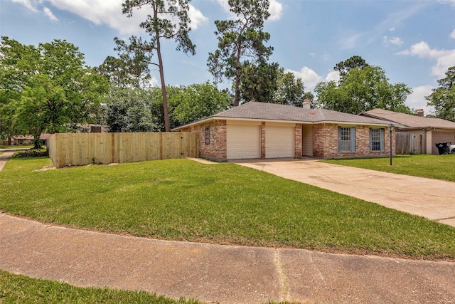 9507 Rannock Way, Spring, TX 77379 - view of front of property with a garage, brick siding, driveway, and a chimney