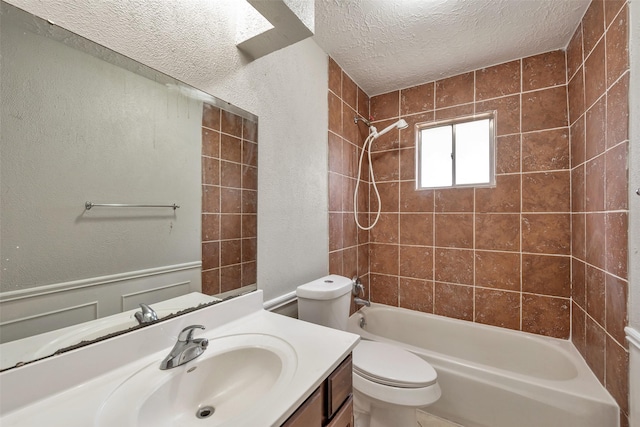 9507 Rannock Way, Spring, TX 77379 - full bath featuring vanity, a textured ceiling, toilet, washtub / shower combination, and a textured wall