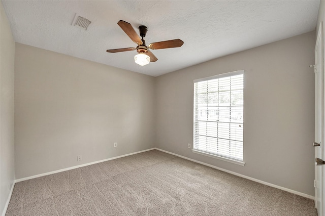 9507 Rannock Way, Spring, TX 77379 - unfurnished room featuring carpet floors, ceiling fan, baseboards, and a textured ceiling