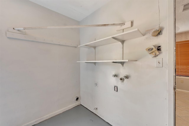 9507 Rannock Way, Spring, TX 77379 - laundry room featuring hookup for an electric dryer, hookup for a washing machine, and baseboards