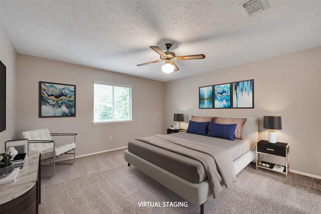 9507 Rannock Way, Spring, TX 77379 - bedroom featuring carpet floors, baseboards, a textured ceiling, and a ceiling fan