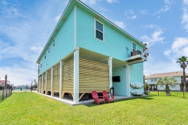 4019 Ector Dr, Galveston, TX 77554 - rear view of property with central air condition unit and a balcony