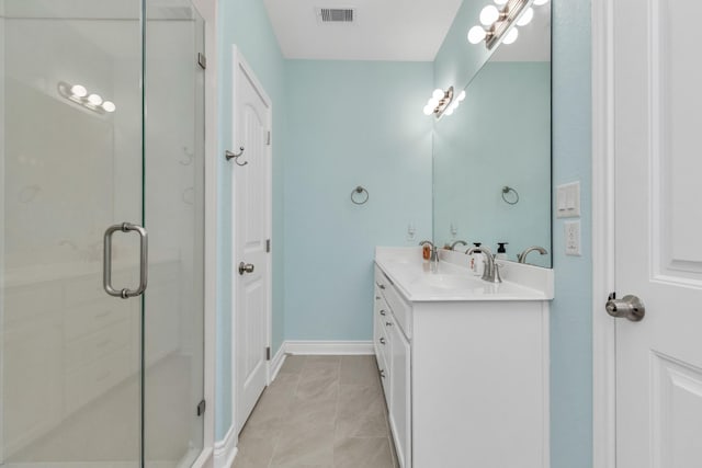 4019 Ector Dr, Galveston, TX 77554 - full bath with a shower stall, vanity, baseboards, and marble finish flooring