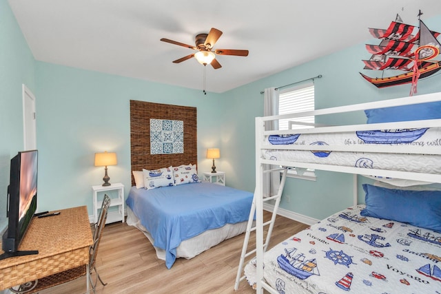 4019 Ector Dr, Galveston, TX 77554 - bedroom featuring wood finished floors, ceiling fan, and baseboards
