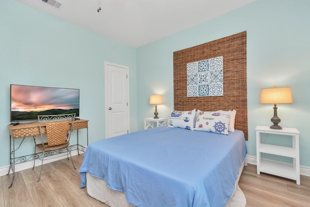 4019 Ector Dr, Galveston, TX 77554 - bedroom with wood finished floors and baseboards