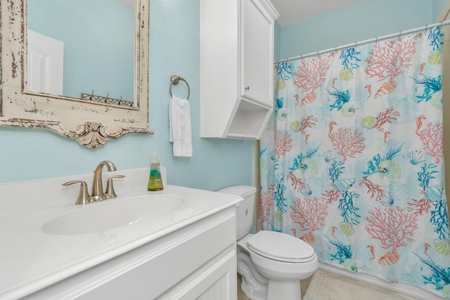 4019 Ector Dr, Galveston, TX 77554 - full bath with toilet, vanity, and a shower with shower curtain