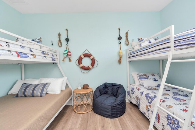 4019 Ector Dr, Galveston, TX 77554 - bedroom with wood finished floors and baseboards
