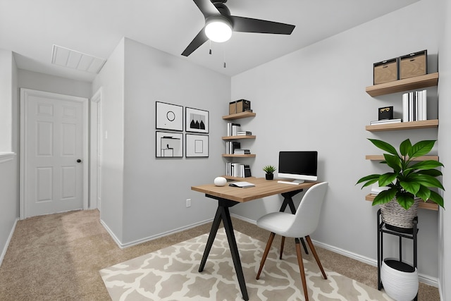 137 E Summerhaze Cir, The Woodlands, TX 77382 - carpeted home office with a ceiling fan and baseboards
