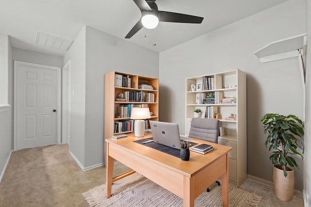 137 E Summerhaze Cir, The Woodlands, TX 77382 - office area with light colored carpet, ceiling fan, and baseboards