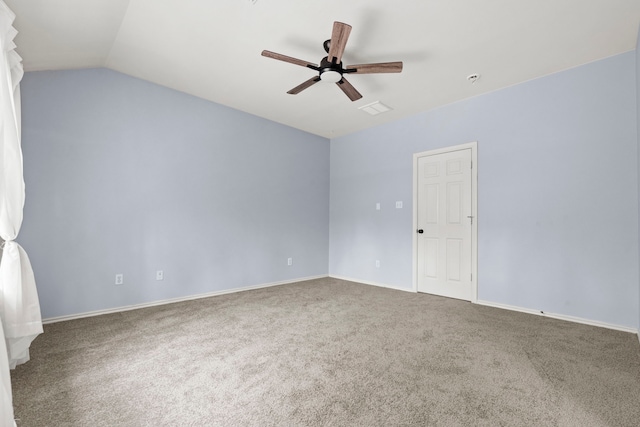 137 E Summerhaze Cir, The Woodlands, TX 77382 - spare room with carpet flooring, ceiling fan, vaulted ceiling, and baseboards
