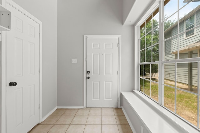 137 E Summerhaze Cir, The Woodlands, TX 77382 - entrance foyer featuring baseboards and light tile patterned floors