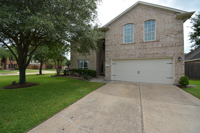 19026 Rustling Ridge Ln, Tomball, TX 77377 - view of front of property featuring brick siding, concrete driveway, a garage, and a front yard
