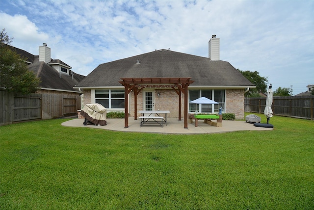 19026 Rustling Ridge Ln, Tomball, TX 77377 - rear view of house with a pergola, a patio area, brick siding, and a fenced backyard