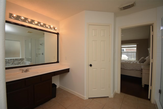 19026 Rustling Ridge Ln, Tomball, TX 77377 - bathroom featuring ensuite bath, vanity, tile patterned floors, and a shower