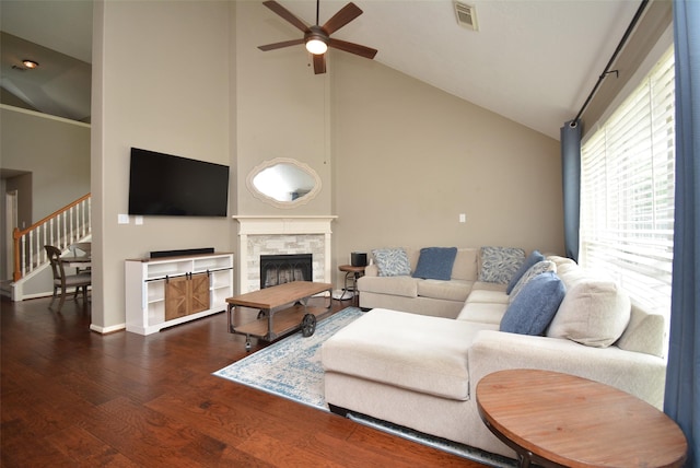 19026 Rustling Ridge Ln, Tomball, TX 77377 - living area featuring high vaulted ceiling, a ceiling fan, wood finished floors, a fireplace, and stairway