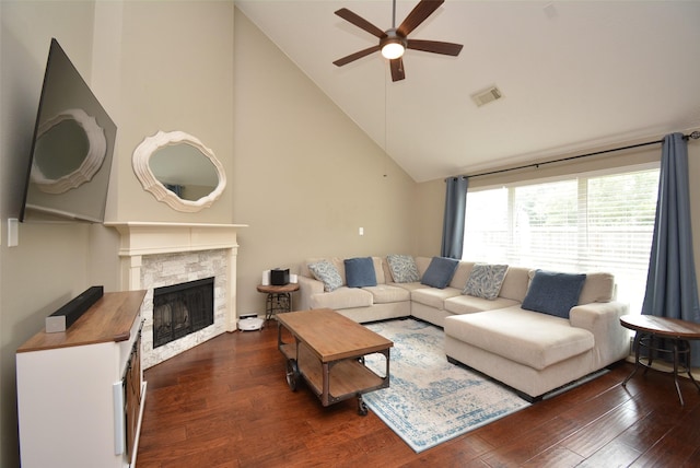 19026 Rustling Ridge Ln, Tomball, TX 77377 - living room featuring ceiling fan, high vaulted ceiling, dark wood-style flooring, and a fireplace