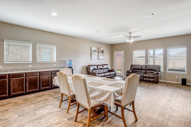 22624 Theodoli Dr, Katy, TX 77449 - dining space featuring light wood-style floors, a ceiling fan, recessed lighting, and baseboards