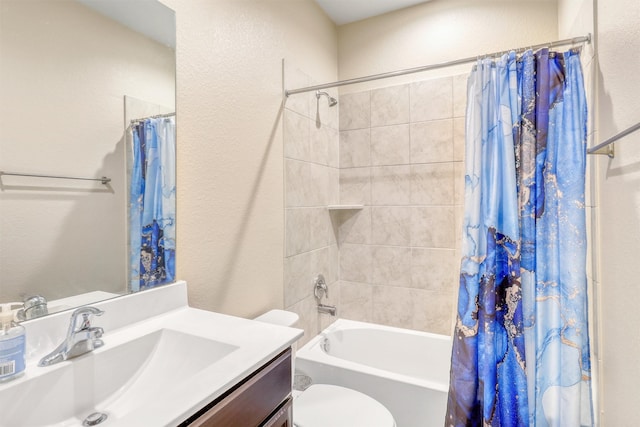 22624 Theodoli Dr, Katy, TX 77449 - full bath with vanity, toilet, shower / bath combination with curtain, and a textured wall