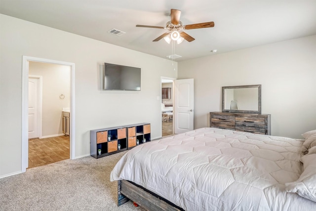 22624 Theodoli Dr, Katy, TX 77449 - bedroom with carpet floors, baseboards, ensuite bath, and ceiling fan