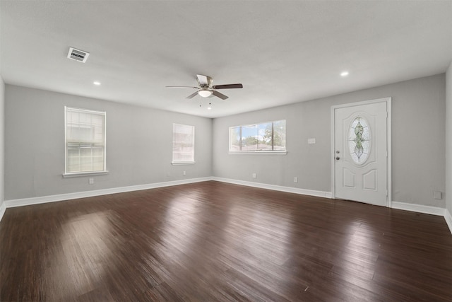10134 Palestine St, Houston, TX 77029 - foyer entrance featuring a ceiling fan, dark wood finished floors, recessed lighting, and baseboards