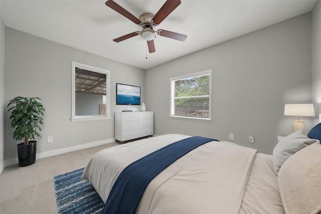 10134 Palestine St, Houston, TX 77029 - bedroom featuring carpet flooring, baseboards, and ceiling fan