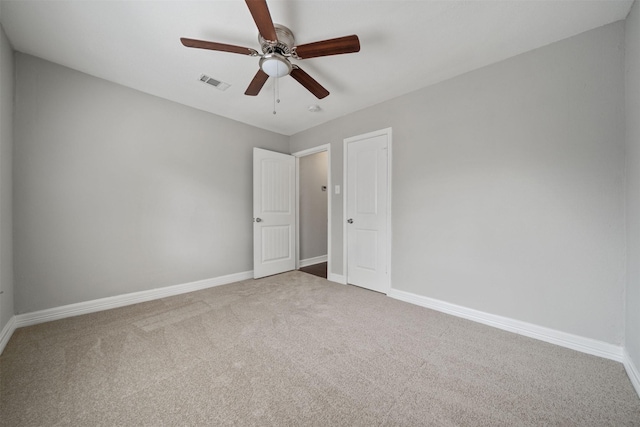 10134 Palestine St, Houston, TX 77029 - empty room with carpet, a ceiling fan, and baseboards