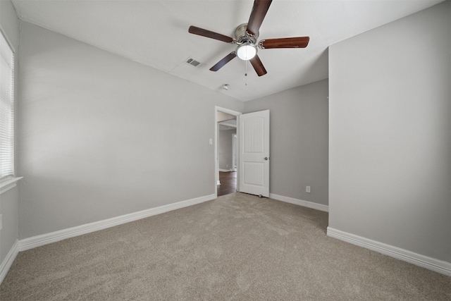10134 Palestine St, Houston, TX 77029 - unfurnished bedroom with carpet flooring, baseboards, and ceiling fan