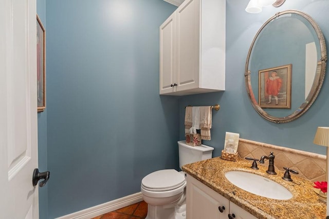 1908 Columbine Dr, Lufkin, TX 75904 - bathroom with vanity, tile patterned floors, and backsplash