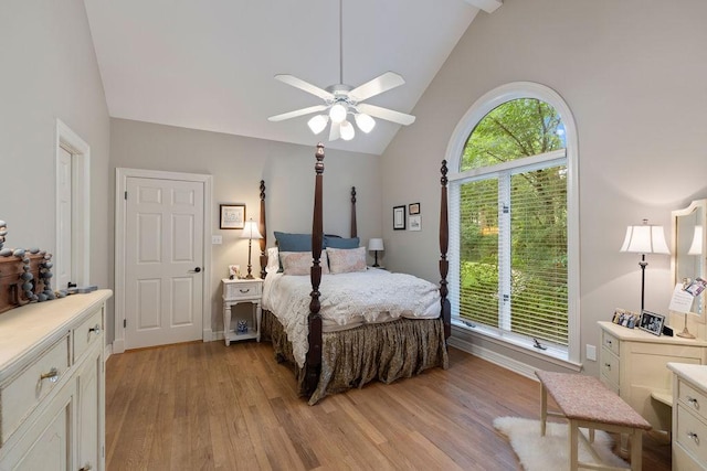 1908 Columbine Dr, Lufkin, TX 75904 - bedroom with light wood-style floors, high vaulted ceiling, and ceiling fan
