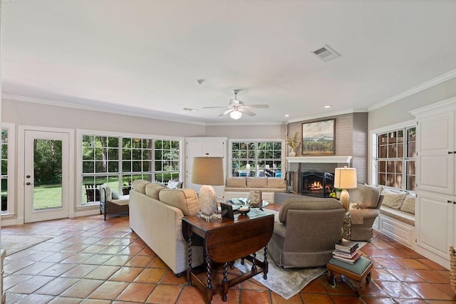 1908 Columbine Dr, Lufkin, TX 75904 - living area featuring crown molding, a fireplace, light tile patterned floors, ceiling fan, and recessed lighting
